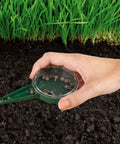 Hand using Two Pack Garden Seed Dispenser Sower Planter Dial With Five Settings For Precise Clump Free Sowing Handy Seeder Tools