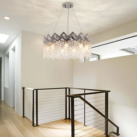 Dope Modern K9 Crystal Chandelier With Nine Lights Raindrop Pendant Ceiling Light Chrome Finish hanging in a modern room