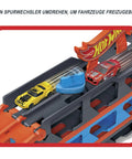 Speedway Hauler Storage Carrier With Three 1 To 64 Scale Cars And Convertible Six Foot Drag Race Track For Kids showing two cars on track