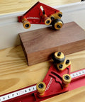 Adjustable Roller Featherboard For Table Saw Feeder With Polyurethane Grippy Wheels And Smooth Guide Rail Heavy Duty Woodworking Jig keeping boards locked tight during cuts on wood.