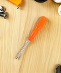 Heavy Duty Hex Socket Screwdriver Wrench With Swappable Bits For Nuts And Bolts on wooden work surface.