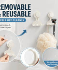 Hassle Free Heavy Duty Suction Cup Razor Holders For Bathroom Sink Organizer With Super Strong No Drill Grip Towel And Loofah Hooks Clutter Free Kitchen And Shower Storage Rack 2 Pack, showing reusable suction hooks on a bathroom wall.