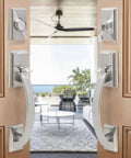 Double Front Door Handle Set With Heavy Duty Lock, Satin Nickel Finish, on elegant wooden doors with interior view