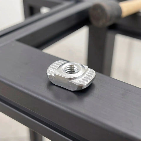 Hella Sturdy 150 Piece Sliding T Nut Set M3 Hammer Head T Slot Hardware drop in fastener on aluminum extrusion frame.
