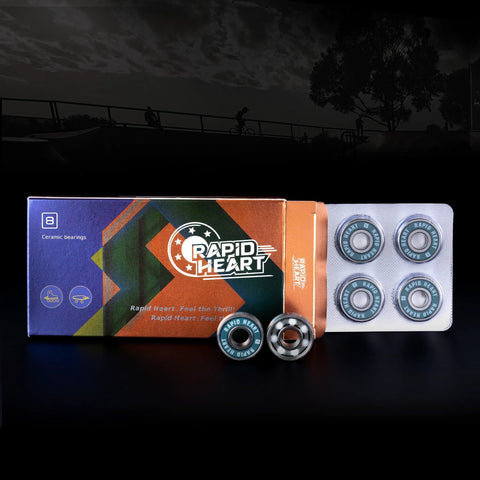 Rapid Heart 8-pack 608 2RS ceramic blue skateboard bearings in blister pack beside colorful box