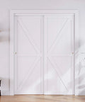 Double Barn Style Sliding Closet Doors 48x80 Inches with Hardware Kit, pre-drilled white MDF panels, installed in a bedroom.