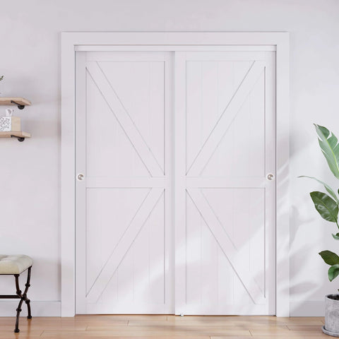 Double Barn Style Sliding Closet Doors 48x80 Inches with Hardware Kit, pre-drilled white MDF panels, installed in a bedroom.