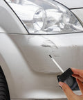 6 Pack Empty Touch Up Paint Bottles 2 Oz Refillable Containers With Brush Applicator for car scratch repair in use