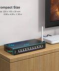 Unmanaged 10Gb Ethernet Switch With 2 10Gb RJ45 Ports And 8 2.5Gb Base-T Ports For Desktop Or Wall Mount, shown on a desk
