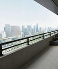 Tall Modern Metal Balcony Railing Extension Kit For Decks And Patios 8 10 12 14 16 20 Inch installed with city skyline view.