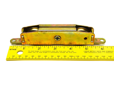 39.10 Sliding Patio Door Tandem Roller Replacement For Wood Aluminum And Vinyl Doors Ideal For Weathershield Andersen Milgard Marvin Jeld Wen And More Includes One Genuine 39.10 Roller Model 31761A with ruler for scale