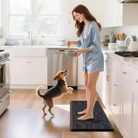 Ergonomic 0.47-Inch Thick Kitchen Mat With Non Slip Waterproof Standing Pad For Home Or Office Comfortable Foam Cushion Large 17.3 By 28 Inch Rug Great For Kitchen Laundry Black in a kitchen setting.