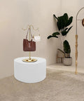 Heavy Duty 220 LB Capacity 20 Inch Round Mannequin Display Pedestal Stand In White For Retail Store Visual Merchandising And Shop Window Presentation Of Apparel Or Accessories With Iron Base with handbags on display.