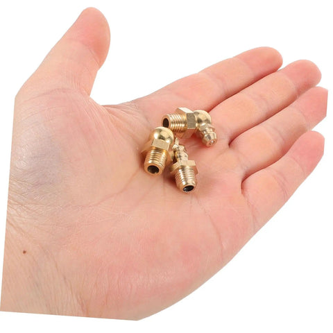 Hand holding nine piece copper grease nipple kit for vehicles with durable copper fittings universal fit hassle free install and long lasting performance for cars trucks tractors and excavators