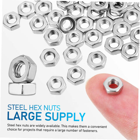 250Pcs Stainless Steel Hex Nuts And Machine Fasteners Pack Shop Drawer Staple For Garage Fixes And Weekend Builds Heavy Duty Metric M4 Hardware Built Tough To Hold Steady Through Rough Jobs, assorted hex nuts with one held in a finger.