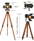 Retro Industrial Tripod Floor Lamp With Black Metal Frame And Natural Wood Legs, Adjustable Height, Stage Light Style Head