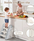 Hella Steady Adjustable Toddler Step Stool With Handles Converts From 3 To 2 Setup As Kiddos Grow Non Slip Safety Footrest For Bathroom Sink And Kitchen Counter Grey in kitchen with child using.