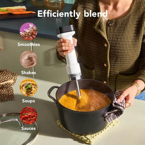Kickass Cordless Hand Blender With Fast Charge Battery Plug Free Smoothie Mixer in pot blending soup with steel blade.