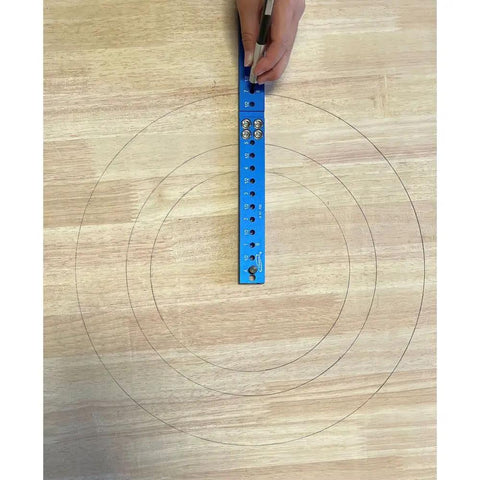 Slick Go To Bandsaw Alignment Gauge With Twelve Inch Laser Etched Sixteenths And Heavy Duty Magnets for marking circles on wood.