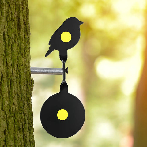 Bird silhouette target on tree, part of Metal Spinning Targets With Auto Reset For BB Guns And Air Rifles, rust-resistant