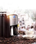 No Fuss Fully Automatic Drip Coffee Maker With Built In Grinder, Large Capacity One Touch Brew System, sleek design with coffee beans.
