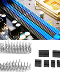 310 Piece 2.54mm Jumper Wire Connector Kit for Electronic Prototyping, includes headers and housings on circuit board close-up