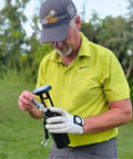 Golfer using Premium Golf Ball Washer With Variable Hex Brush System Portable Ball Cleaner For Golf Bag Or Cart North American Made