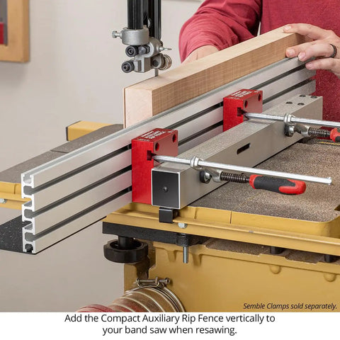Rock Solid 36 Inch Auxiliary Rip Fence For Table Saw Job Site Extension Featuring Straight Shooting T Track Rails and Dual Jaw Clamping Blocks For Dead Accurate Cuts in use on a band saw.
