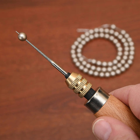 Close-up of Diamond Reamer Set with Four Interchangeable Tips, wood handle, and storage tube for jewelry making crafts.