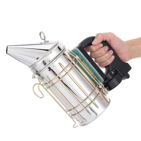 Heavy Duty Stainless Steel Electric Beekeeping Smoker With Heat Shield in hand, features a sturdy black handle
