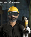 Man wearing Top Shelf Flip Up Welding Goggles With Anti Scratch Lens For Metalwork And Industrial Eye Protection with a protective helmet.