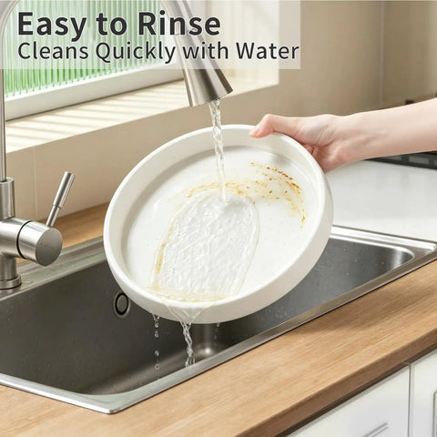 Person rinsing an 11 8 inch Lazy Susan turntable under water in a kitchen sink, showcasing easy cleaning.