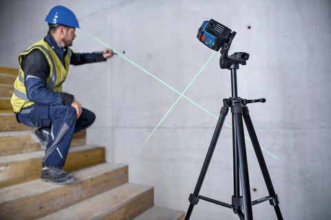 Rechargeable Self Leveling Cross Line Laser With Dual Power Options AA Batteries Or Li Ion Pack IP55 Rugged Jobsite Ready on tripod