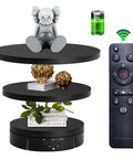 Stunning 3 in 1 Motorized Rotating Display Stand With Remote Control Max 22 Lbs Load For Jewelry Watches Products Photography Shoots Smooth 360 Electronic Turntable showing decor items on a sleek black multi-level platform.