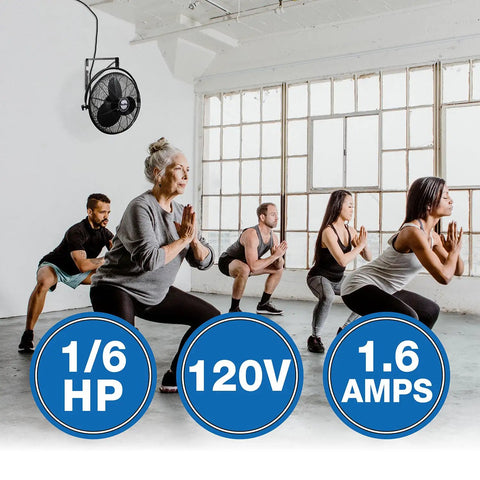 Group exercising in gym with Industrial Grade Wall Mount Fan 20 Inch Black One Sixth Horsepower Three Speed 120 Volt in background