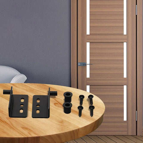 Pair Of Heavy Duty Iron Hinges With Bushings And Protective Plastic Caps on table ready for easy installation on wooden doors.