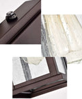 Close-up of Dusk To Dawn Outdoor Wall Light With Seedy Glass In Vintage Farmhouse Bronze Finish 12.25 Inch Sconce.
