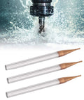 Three silver tungsten carbide end mills with copper tips, 4-flute CNC cutters, 10mm cutting length, side view