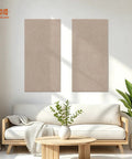 Oversized Self Adhesive Acoustic Wall Panels Made From Dense Polyester Fiber For Quiet Room Treatment And Bass Absorption Suitable For Home Studios Or Living Areas Delivers Premium Camel Color Paired With Quick Peel Stick Two Pack positioned above a couch in a bright living area.