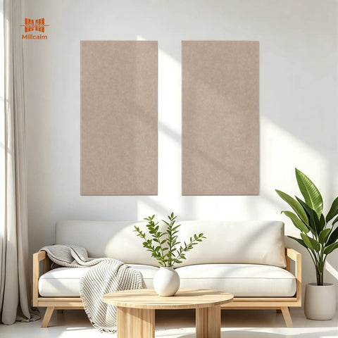 Oversized Self Adhesive Acoustic Wall Panels Made From Dense Polyester Fiber For Quiet Room Treatment And Bass Absorption Suitable For Home Studios Or Living Areas Delivers Premium Camel Color Paired With Quick Peel Stick Two Pack positioned above a couch in a bright living area.