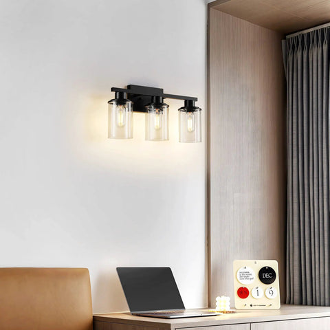 Dope Black Bathroom Vanity Light Fixtures Over Mirror 3-Light Wall Sconce With Clear Glass Shades in modern room.