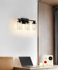Black Bathroom Vanity Light Fixtures Over Mirror 4 Light Modern Wall Sconce Lamps With Glass Shades above a desk.