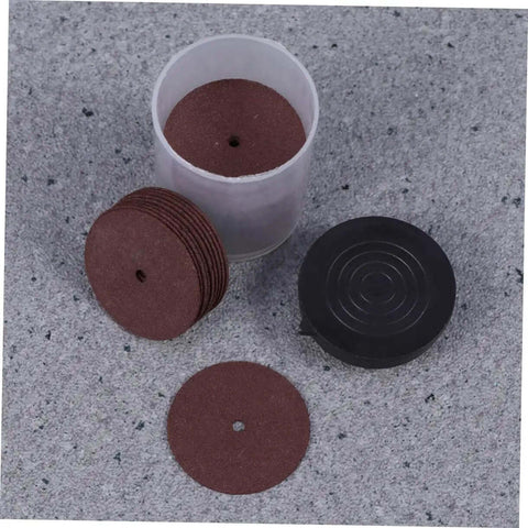 36 Piece Grinding Wheel And Cutting Disc Set for metalworking tools, showing red grinding wheels and black container on gray surface.