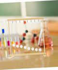 Wooden snake shape pendulum energy conservation DIY kit for hands-on physics experiments shown on a science lab table