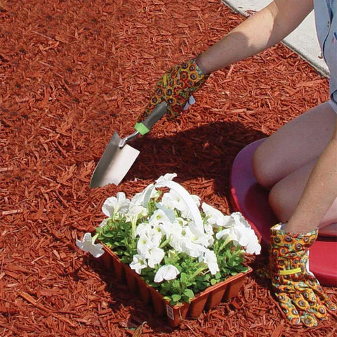 Person using Stainless Steel Hand Trowel With Ergo Gel Grip 13 Inch Cushioned Comfort Handle for planting in garden