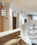 Two Pack 5 Inch Crystal Pendant Lights With Brushed Nickel Finish over kitchen island