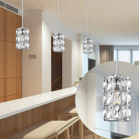 Two Pack 5 Inch Crystal Pendant Lights With Brushed Nickel Finish over kitchen island