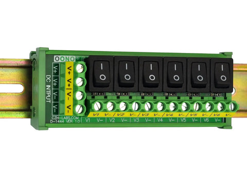 Beefy Six Channel DC Power Distribution Strip With DIN Rail Mount And Rocker Switches, 0 To 50V, 30A Total, Each Channel Up To 10A, 6 Outputs, Wire Up To 26 To 10 AWG, Heavy Duty Industrial Power Control Module, front view, showing all channels and switches.