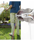 Heavy Duty Garden Hose Reel With Wall Mount Cart Runs Like A Charm For Outdoor Yard Water Storage Holds Up To 131 Feet in use watering garden.