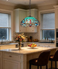 ARTZONE Antique Tiffany Pendant Light Fixture Stained Glass Hanging Lamp above marble kitchen island with flowers and fruits.